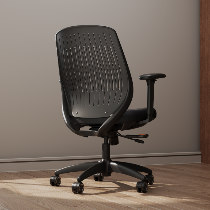 ErgoStretch black office chair with ventilated backrest, displayed in a modern home office.