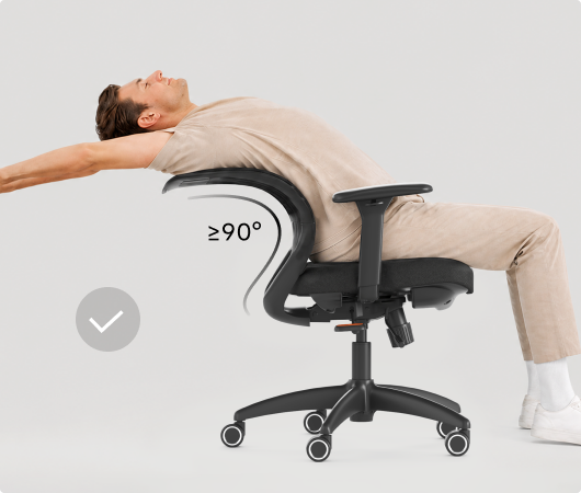 Man stretching deeply on the ErgoStretch chair, achieving a ≥90° back extension for full spine relaxation.