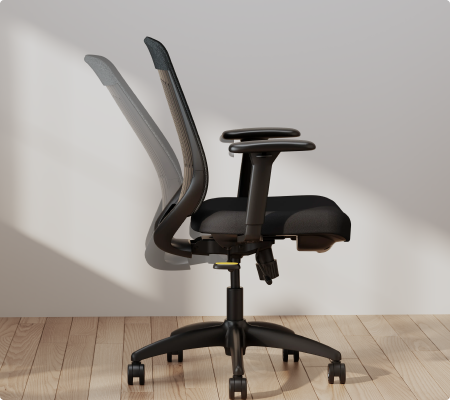 ErgoStretch chair backrest recline adjustment, showing the chair leaning back for comfort.